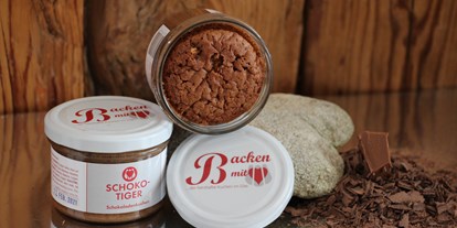 Händler - vegane Produkte - Schokotiger
unverschämt schokoladig.....
Schokoladekuchen mit feinem Nougatkern - Backen mit Herz e.U.