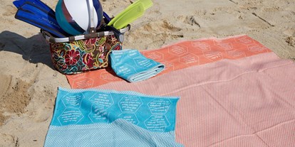Händler - Produkt-Kategorie: Küche und Haushalt - Oberösterreich - Strandtücher bzw. Freizeittuch aus BIO-Baumwolle, mit eingewebten Botschaften. - verum textilia by Armin Landskron
