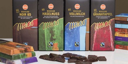 Händler - Seekirchen am Wallersee - Hochwertige Schweizer Schokolade, bio und fair, ohne Aluminiumwickel und Sojalezethin - Weltladen Gneis